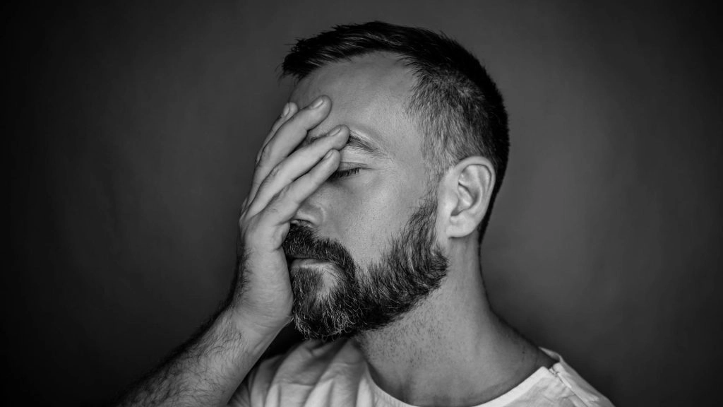 DCF Investigations: How Specialized Legal Representation Protects Families 7 stressed father seeking specialized legal representation for dcf battle