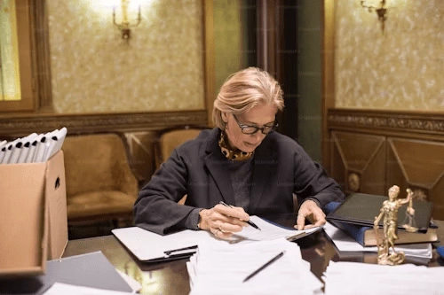 Why You Shouldn't Remove a Difficult DCF Social Worker from Your Case: Specialized Advice 18 A professional woman explaining important documents to a concerned couple in an office setting